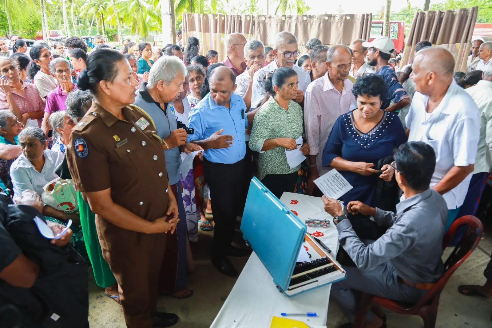 Elderly patients waiting at a Sanjaya Foundation medical camp