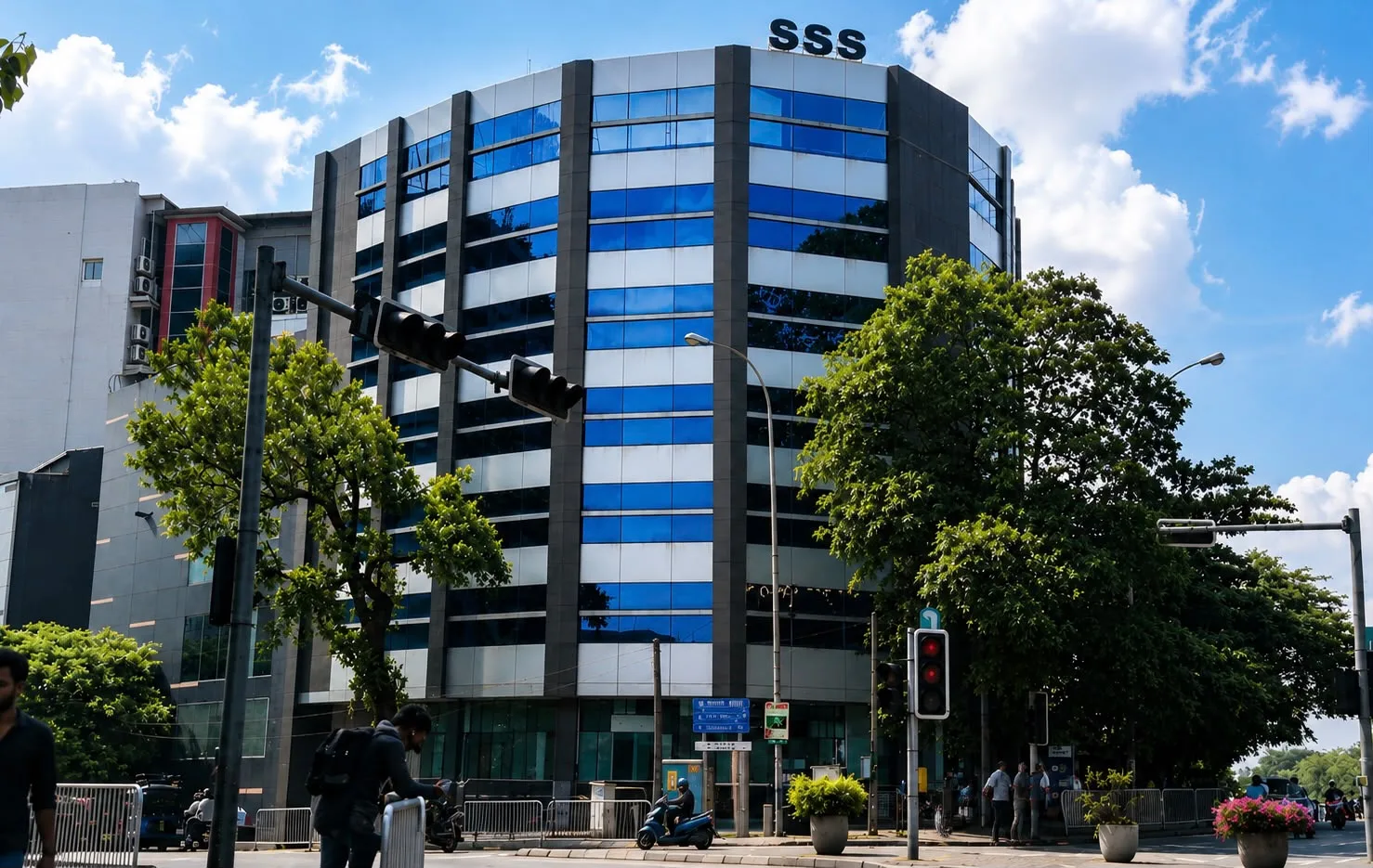 Sedara Senarath Group head office, a curved blue-glass building on Vauxhall Street, Colombo 02